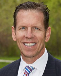 Joel G. Carson, Executive Director
